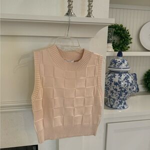 sleeveless knit sweater